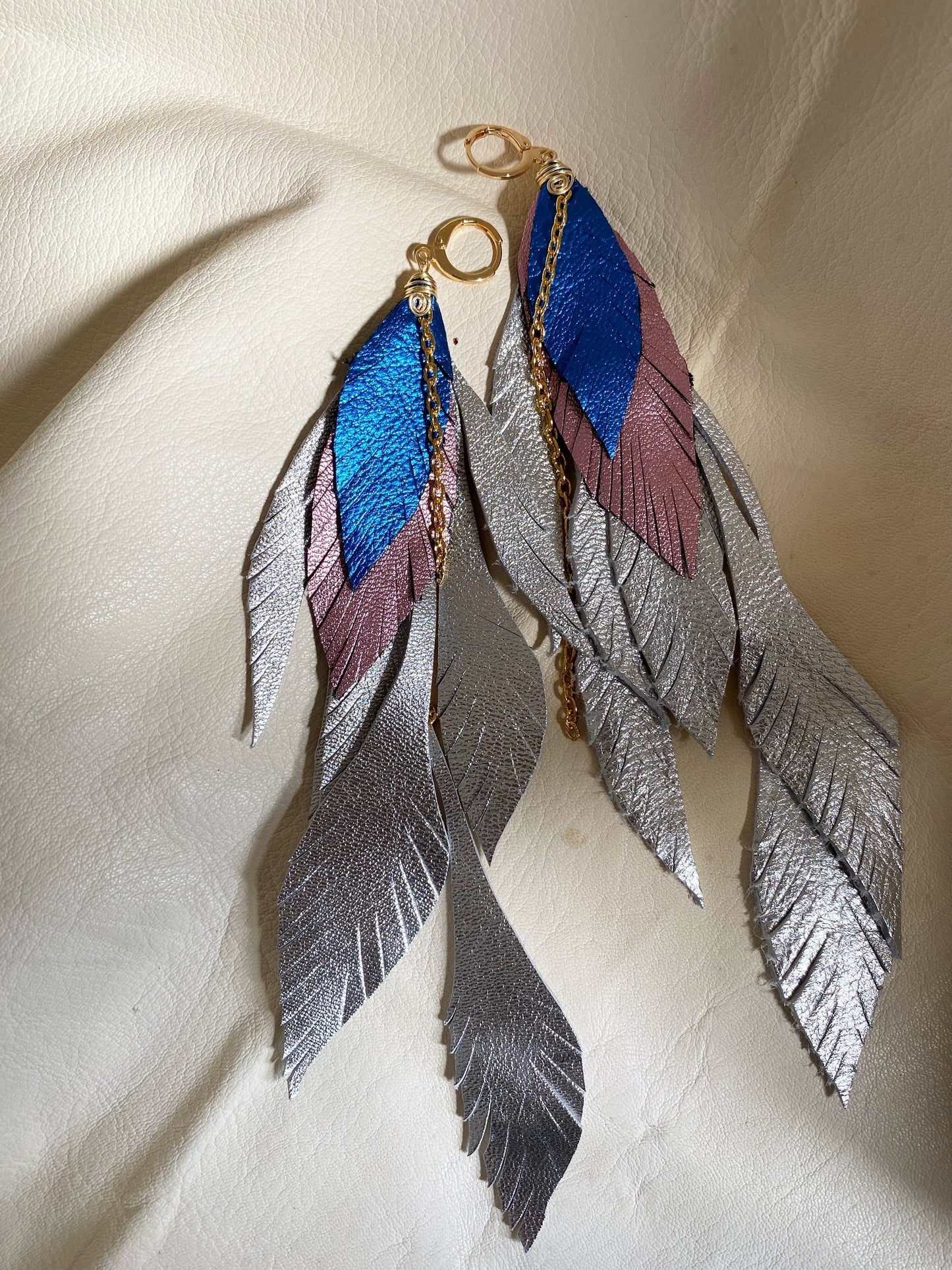 Aretes Gyps pluma triple Plata
