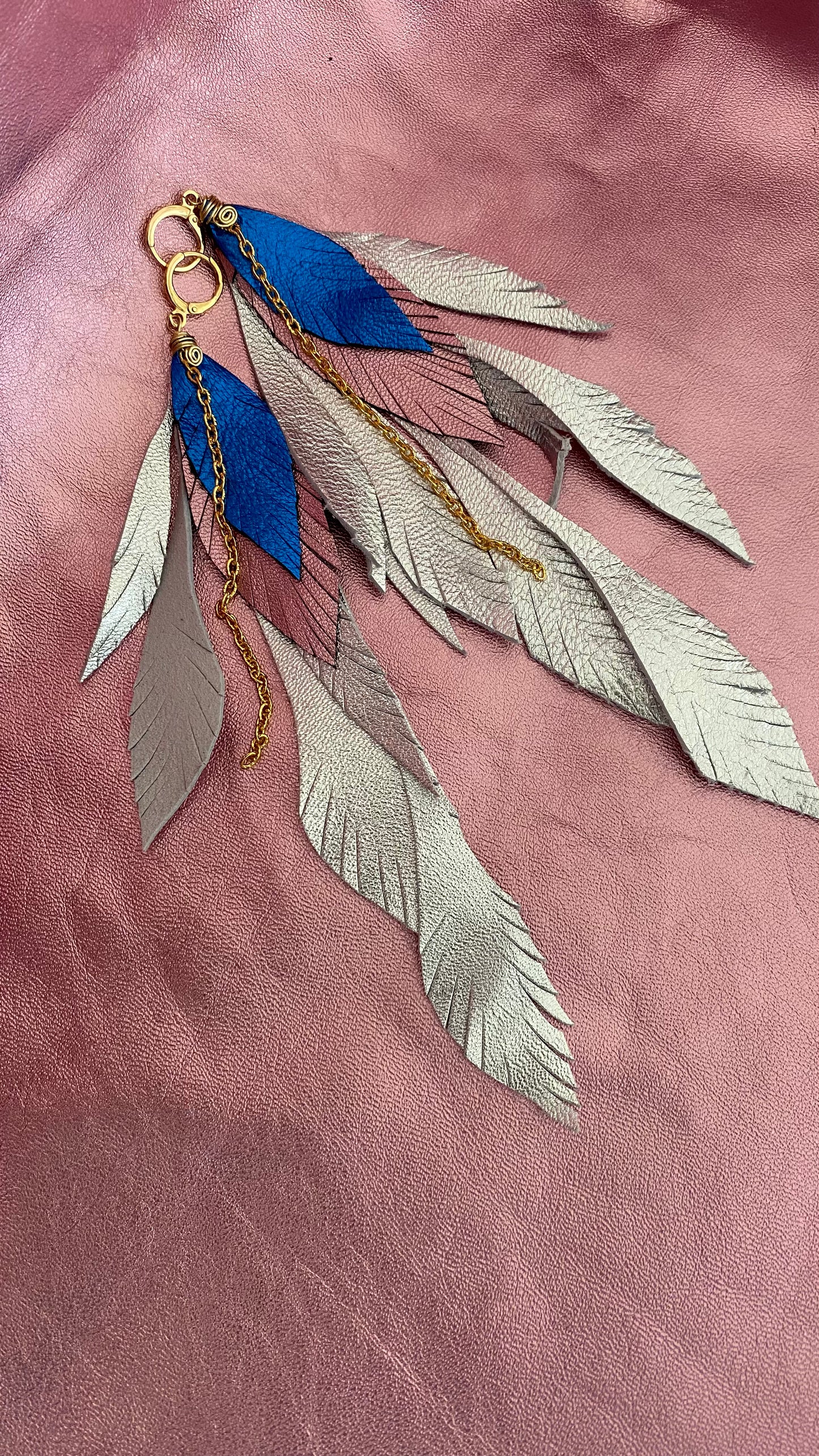 Aretes Gyps pluma triple Plata